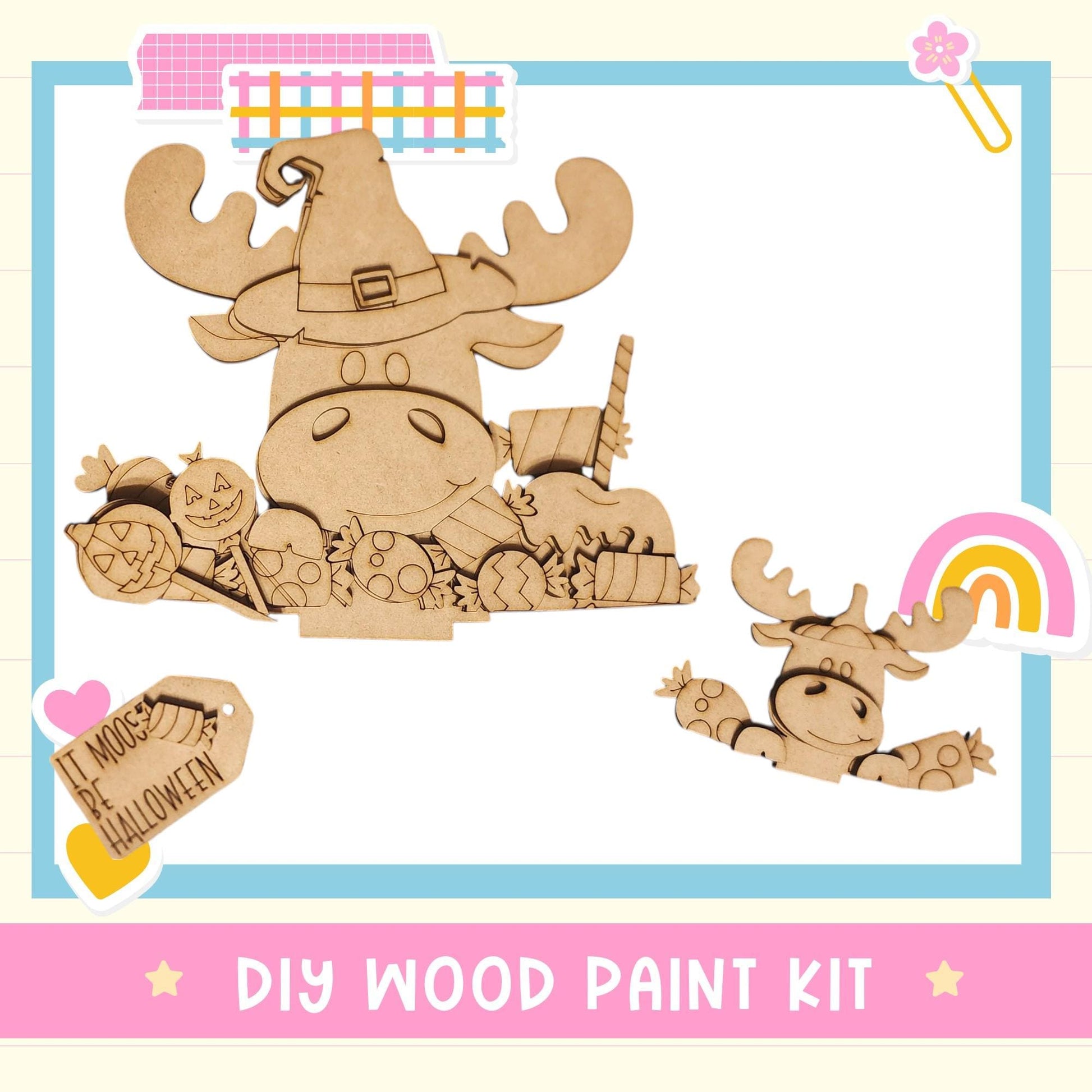 The image is a DIY wood paint kit featuring a wooden moose and a carved pumpkin, along with other Halloween-themed decorations.
