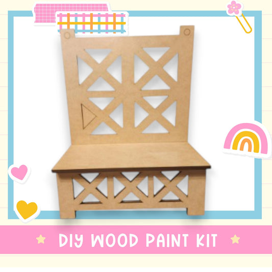 a wooden bench with a rainbow in the background