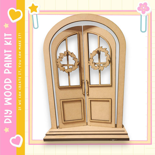 a wooden door with wreaths on either side, set within a decorative frame.