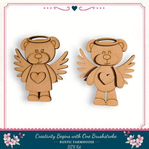 two wooden cutouts of teddy bears with wings, arranged side by side against a white background.