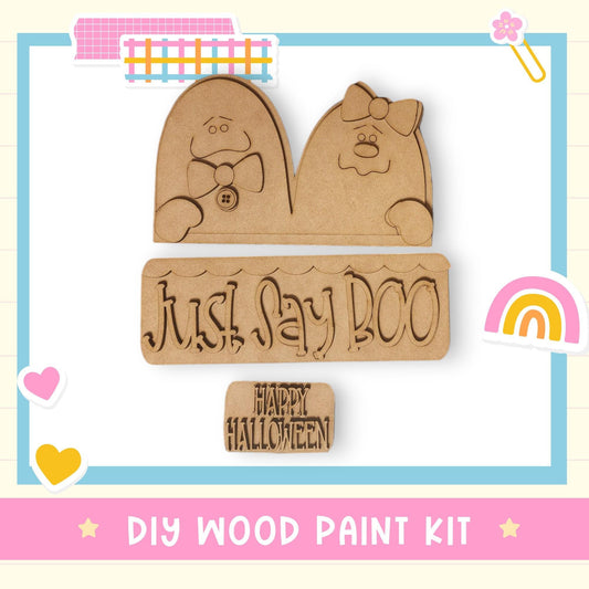 a wooden stamp with a bear and a rainbow in the background