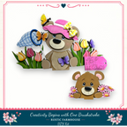 The image is a collage featuring two teddy bears, one wearing a pink hat and the other wearing a yellow hat, surrounded by flowers and butterflies. The collage is titled "Creativity Begins with One Brushstroke" and includes a DIY kit from the Rustic Farmhouse.