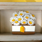 a picture of a bunch of daisies on a shelf
