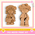 two wooden teddy bear figures, one standing and one sitting, against a pink and white background.