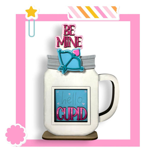 a picture of a coffee mug with the words be mine on it