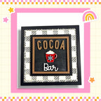 a picture of a picture of a sign that says cocoa bar