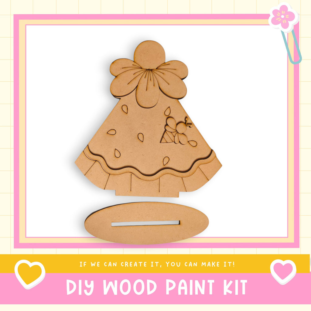 a DIY wood paint kit, including a wooden piece with a flower design and a stand, along with a heart and a flower motif.