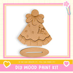 a DIY wood paint kit, including a wooden piece with a flower design and a stand, along with a heart and a flower motif.