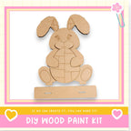 a DIY wood paint kit, with a cute bunny-shaped figure made of cardboard as the main focus.