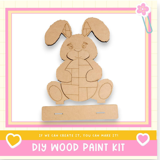 a DIY wood paint kit, with a cute bunny-shaped figure made of cardboard as the main focus.
