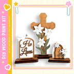 a wooden cross with white flowers, a wooden tomb with a bird, and a wooden door with white flowers, all set against a pink and yellow background.