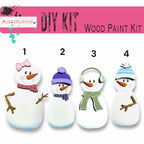 a number of snowmen with hats and scarves
