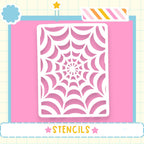 a white spider web stencil with a pink background.
