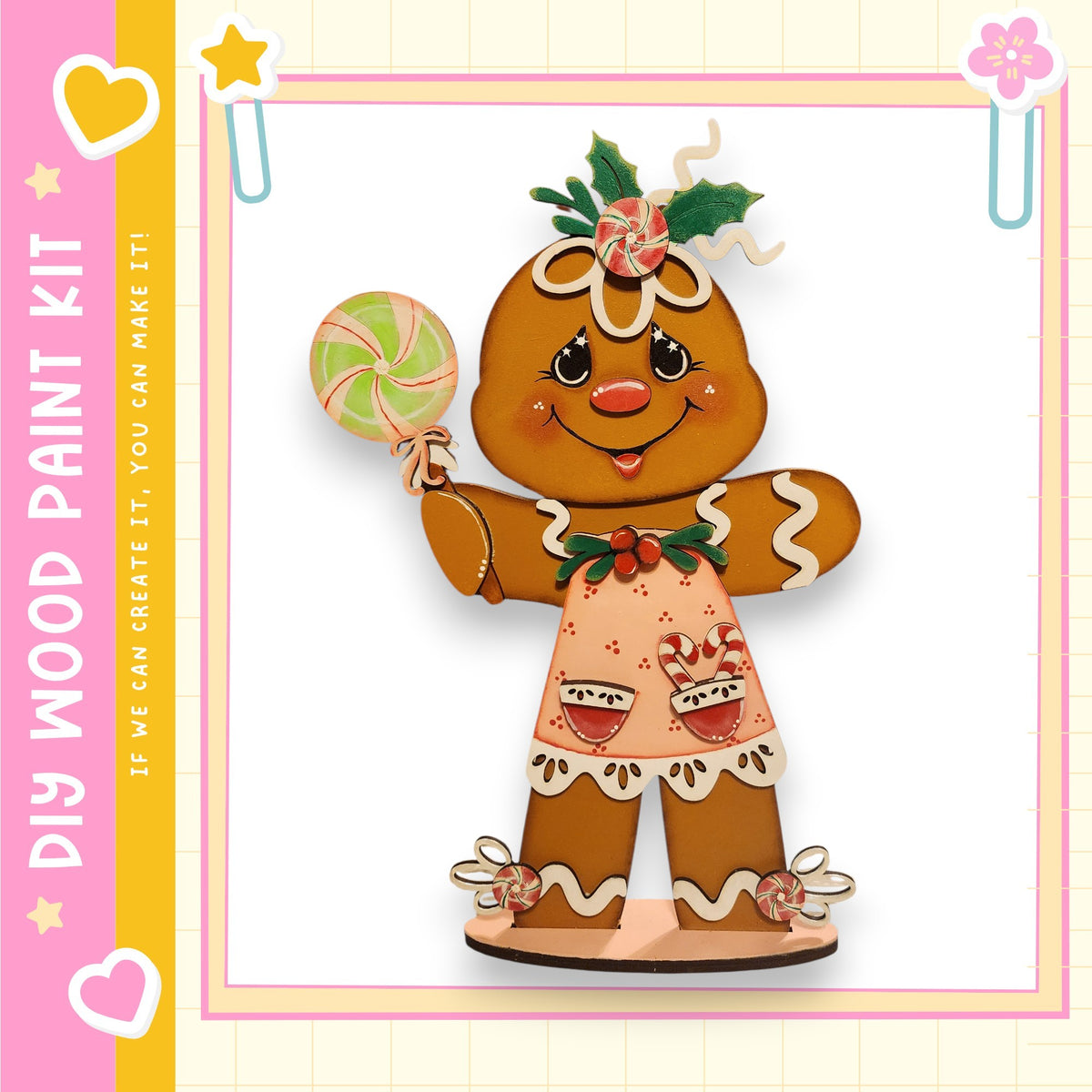 A wooden gingerbread man figure holding a lollipop and wearing a festive outfit with a flower crown.