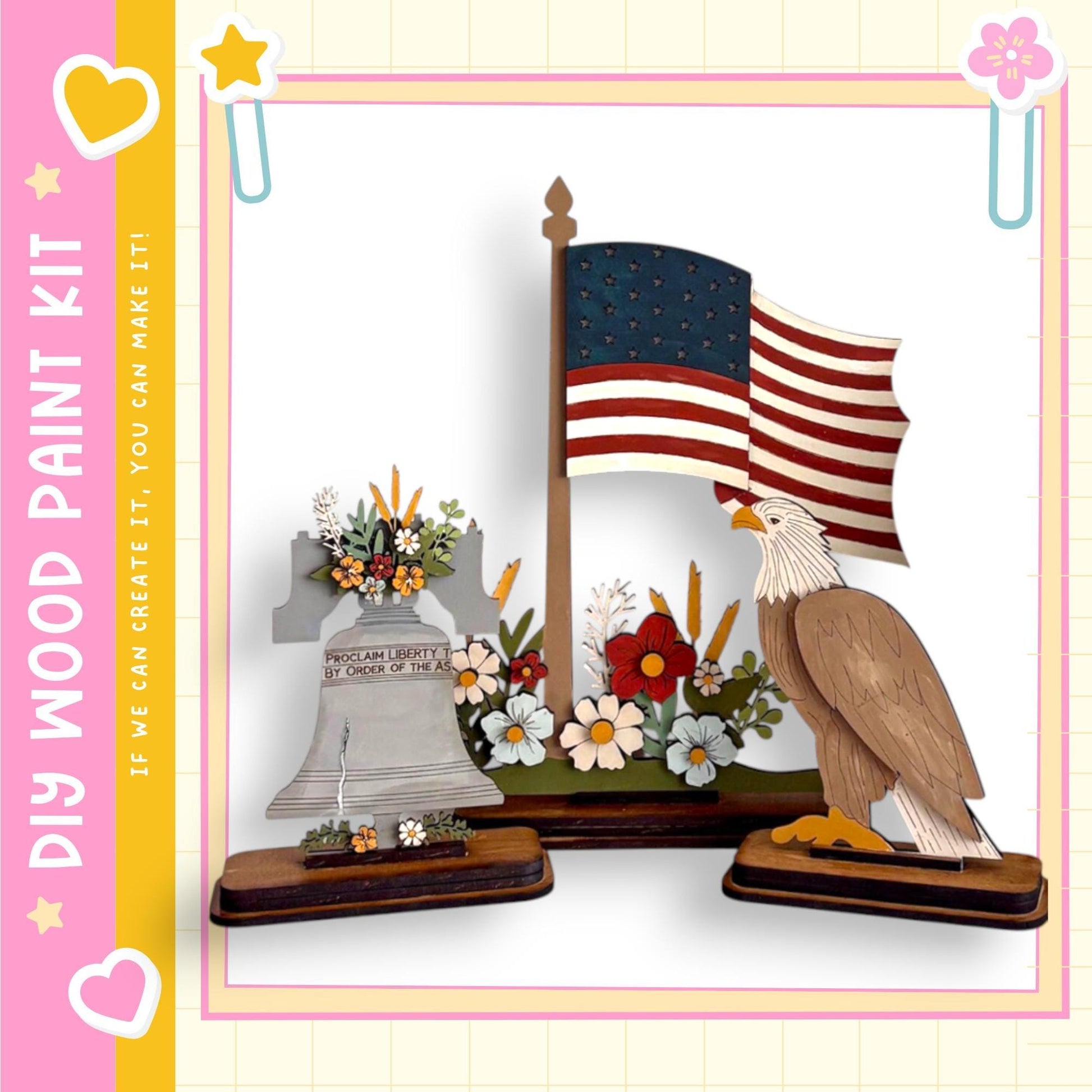 a wooden paint kit that includes a patriotic display with an American flag, a statue of the Liberty, and a bird, likely an eagle, perched on a wooden stand.