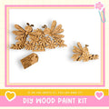 The image is a DIY wood paint kit featuring a wooden butterfly and flower design.