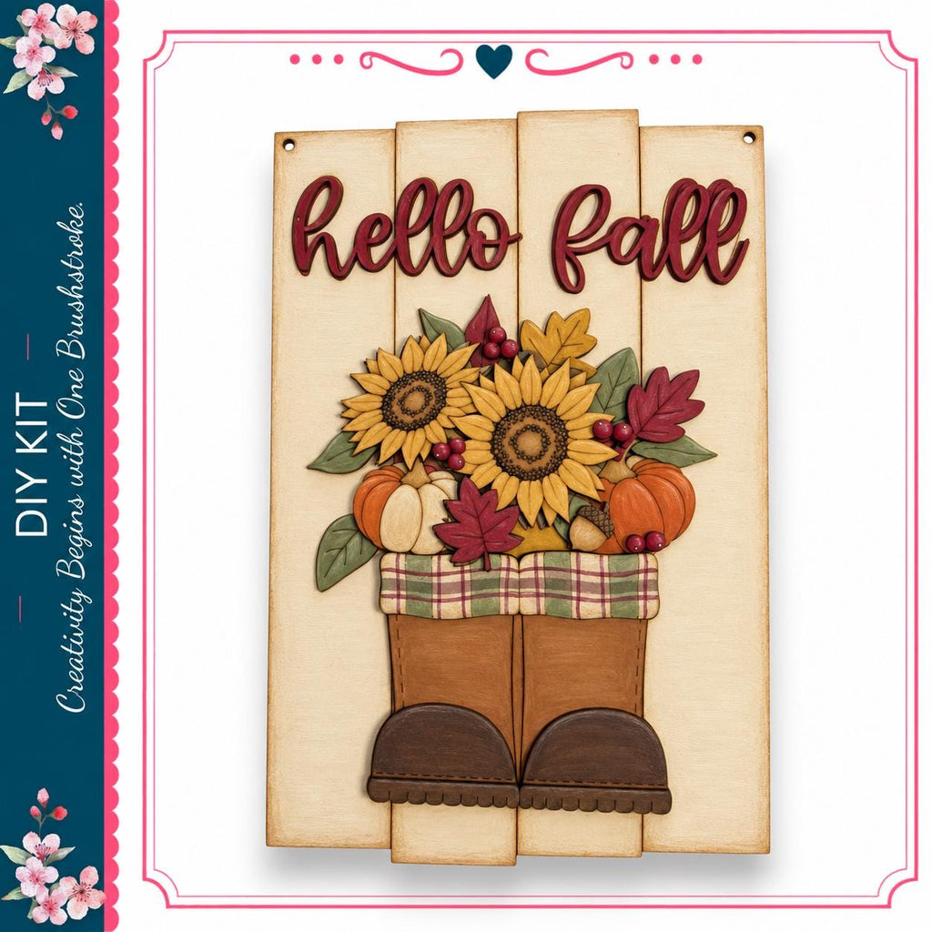 a wooden sign with the text "Hello Fall" and a decorative arrangement of sunflowers, pumpkins, and leaves.