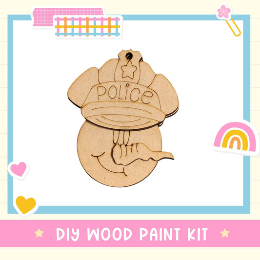 a DIY wood paint kit, including a wooden police hat and a wooden smiley face.