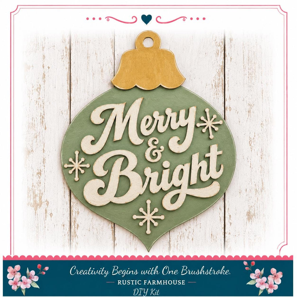 A green ornament with the text "Merry & Bright" and snowflake decorations, placed on a white wooden background.