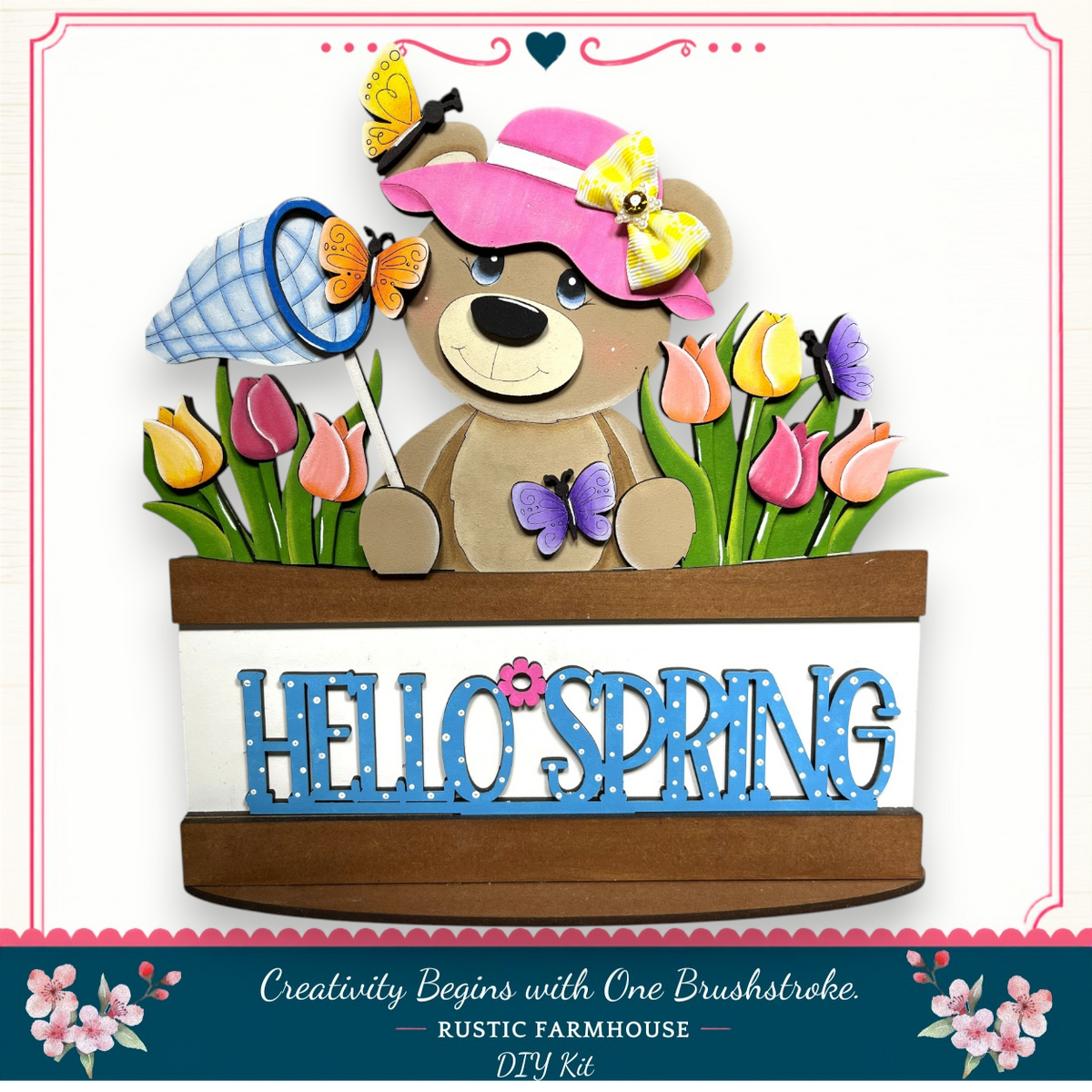 A teddy bear wearing a hat and holding a net is surrounded by flowers and butterflies, with the word "Hello Spring" written on a wooden sign below.