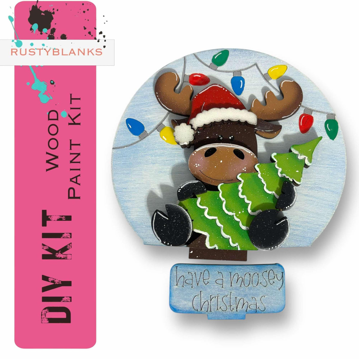 a christmas ornament with a moose holding a christmas tree