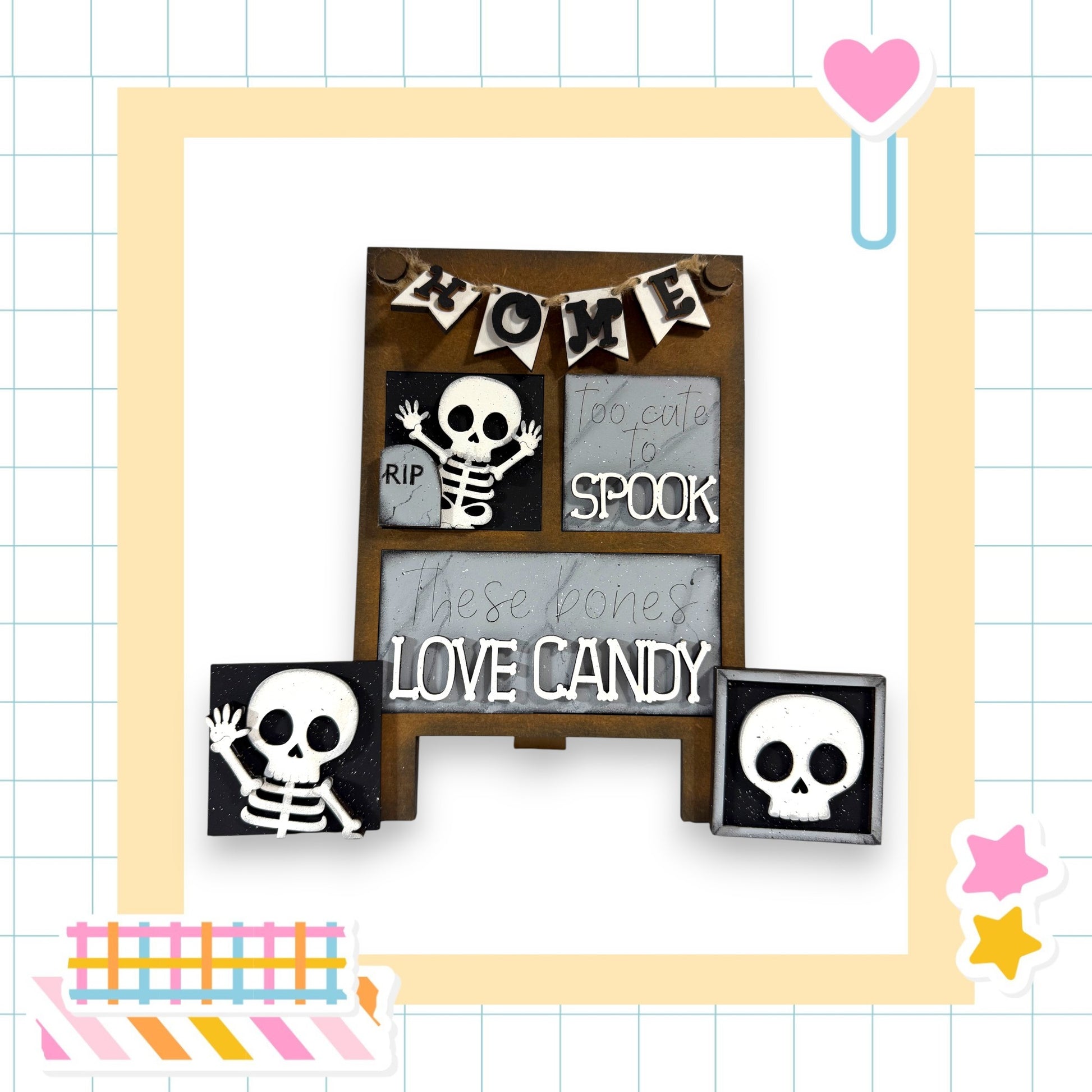 a Halloween-themed display with a skeleton decoration and a sign that reads "These bones love candy".