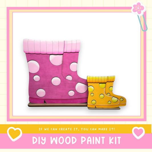 a DIY wood paint kit, with two colorful wooden boot-shaped figures in the foreground. The text below the image encourages creativity and says, "If we can create it, you can make it!"