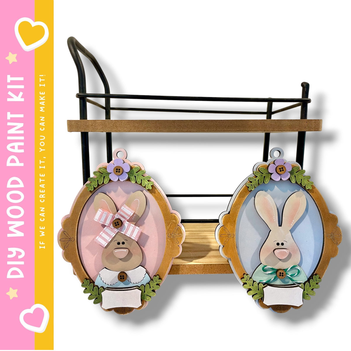 two wooden Easter bunny ornaments hanging on a wooden rack.