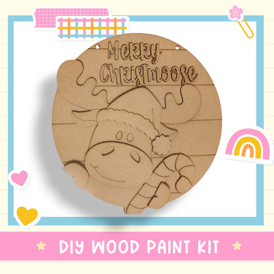 a wooden christmas ornament with a sheep on it