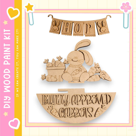 a wooden Easter-themed decoration kit, including a wooden bunny, a wooden banner, and a wooden sign.