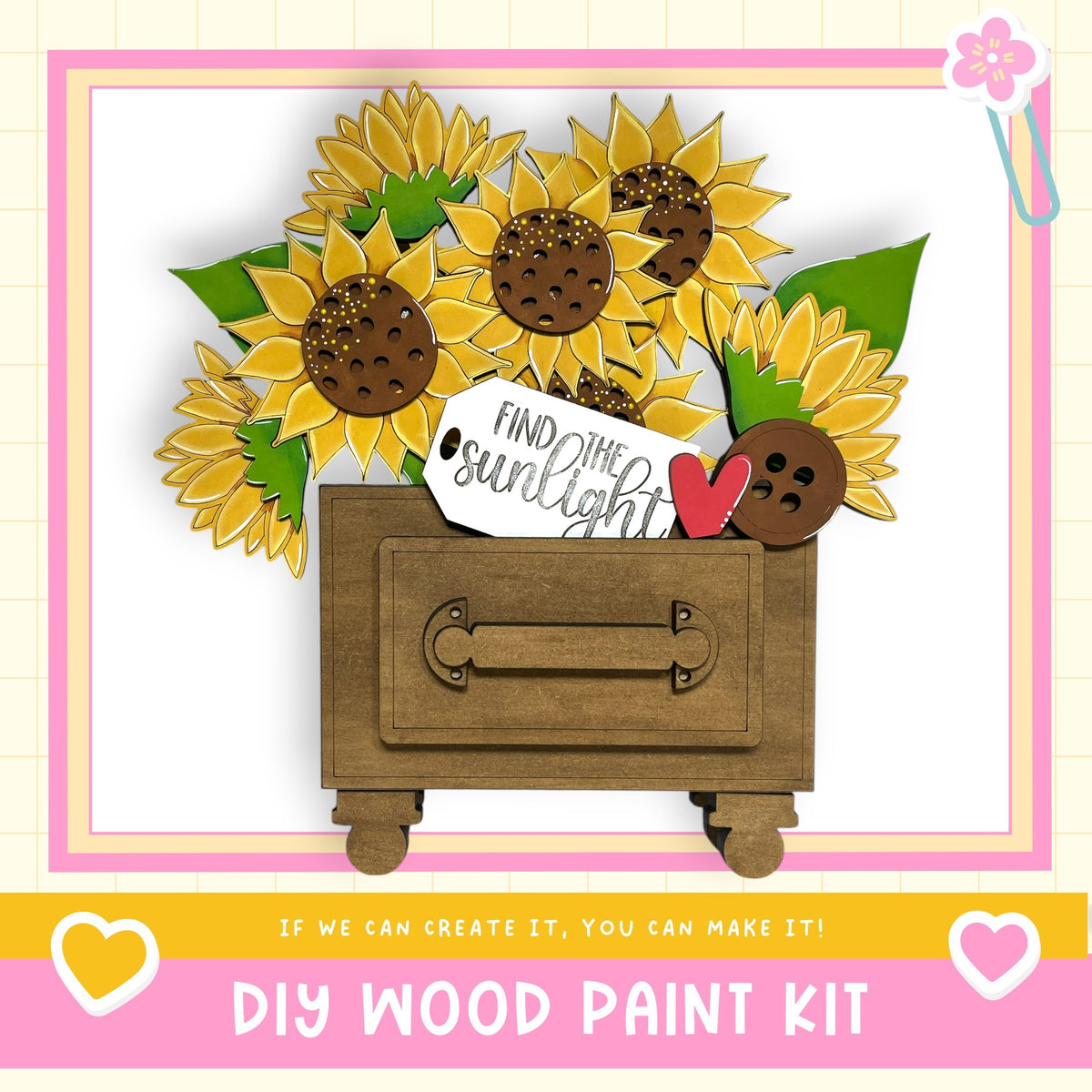The image is a DIY wood paint kit featuring a wooden drawer with a handle, decorated with a bouquet of sunflowers. The text on the image reads "If we can create it, you can make it!" and "DIY WOOD PAINT KIT".