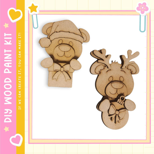 two wooden cutouts of bears, one wearing a hat and the other with antlers, displayed against a pink and yellow background.