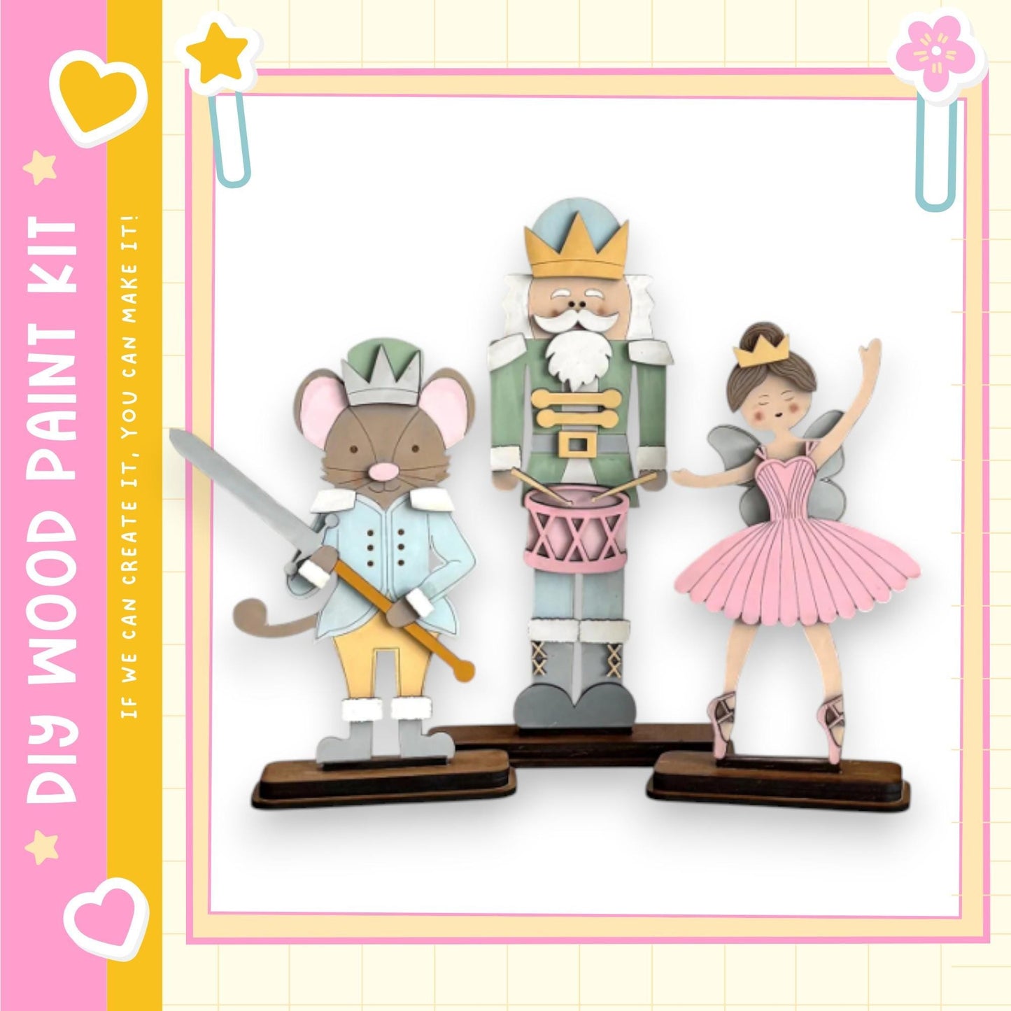 A wooden paint kit depicting a nutcracker, a mouse, and a ballerina, with a pink and yellow border.