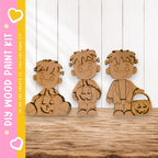 A wooden paint kit featuring three cartoon-like figures, including a pumpkin and a character with a pumpkin-shaped head.
