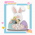 a picture of a bunny with a basket of eggs