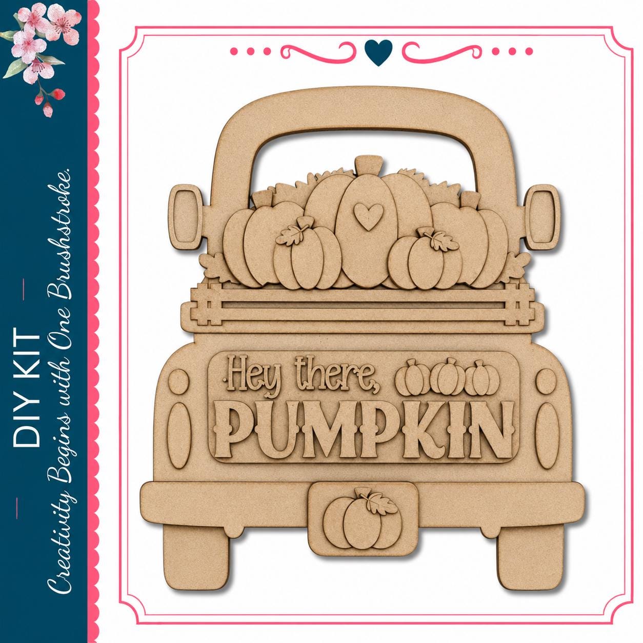 A wooden truck with a decorative pumpkin design on the back.