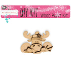 a wooden cutout of a moose with a hat