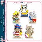 a collection of five cute cat figurines, each wearing different outfits and accessories, including a yellow hat, a blue and white striped hat, a red bucket, a blue shovel, and a pink and white striped hat.