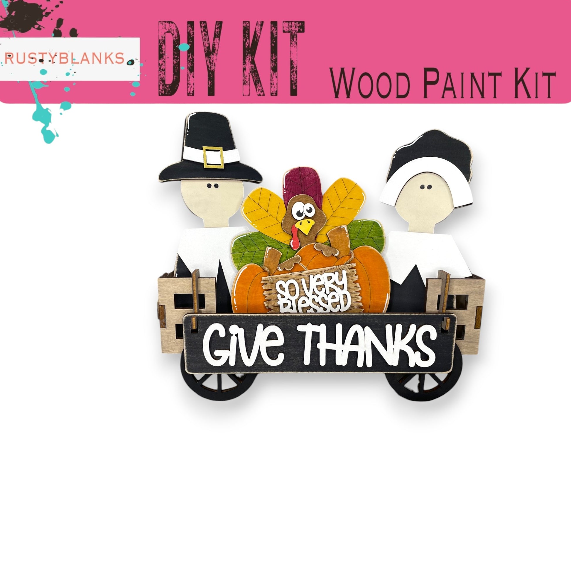 a cutout of a thanksgiving scene with a sign that says give thanks