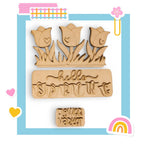 a wooden stamp with flowers and the words hello spring