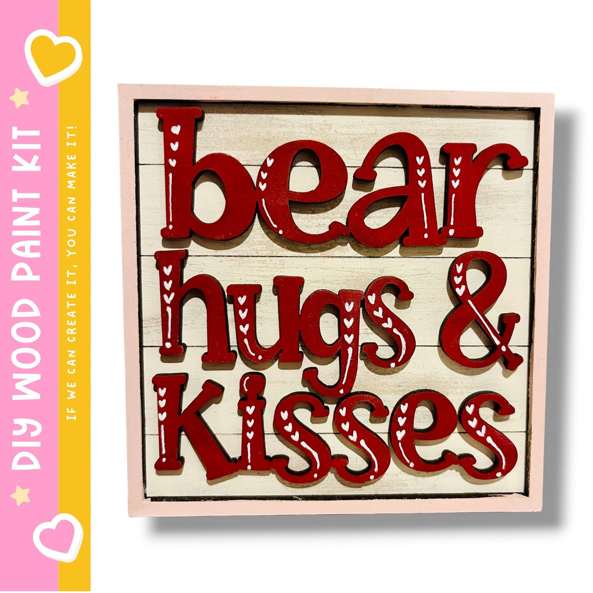 a wooden sign with the words "bear hugs & kisses" written in red letters.