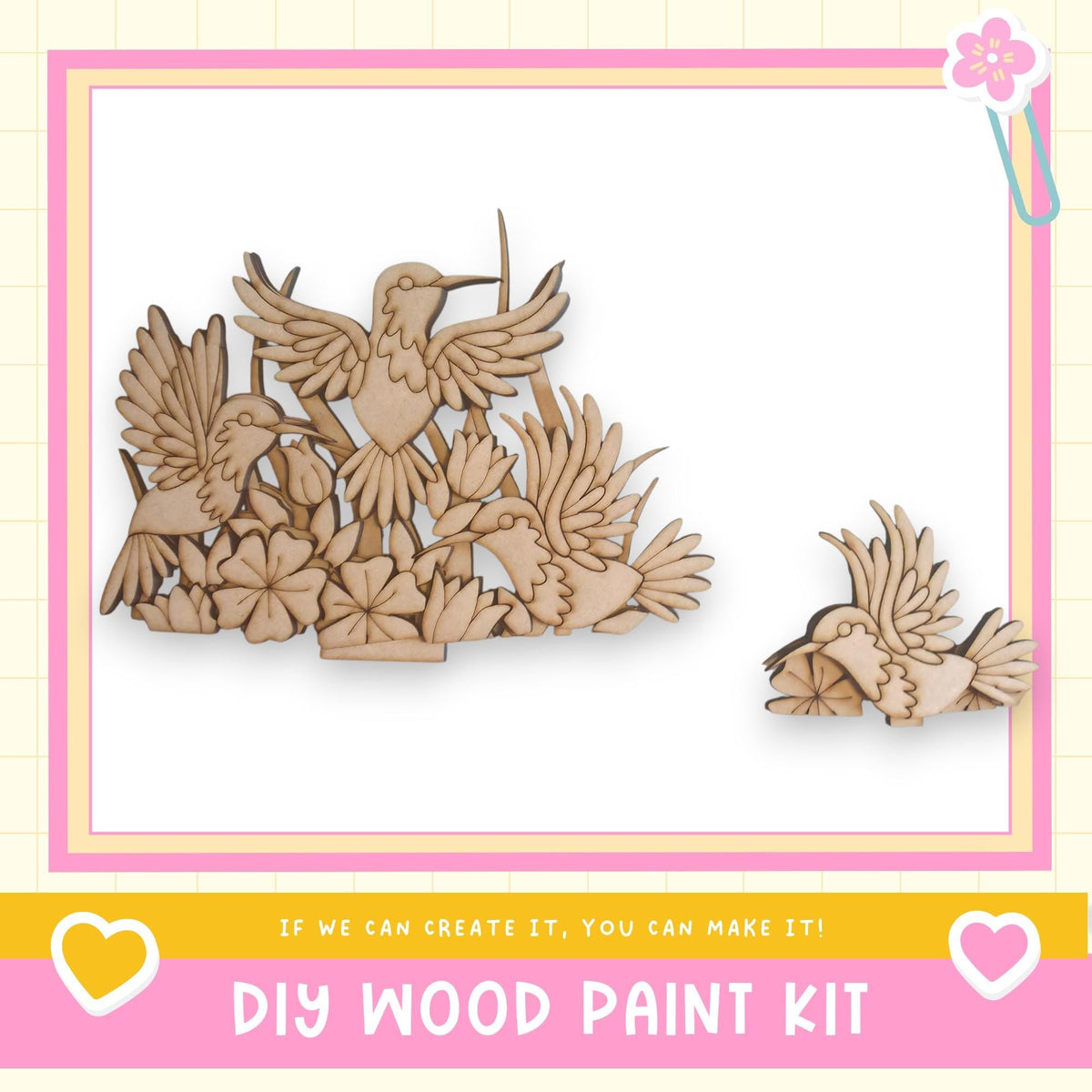 a DIY wood paint kit, with a large wooden bird sculpture and smaller wooden birds displayed in a frame.