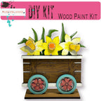 a picture of some flowers in a wooden box