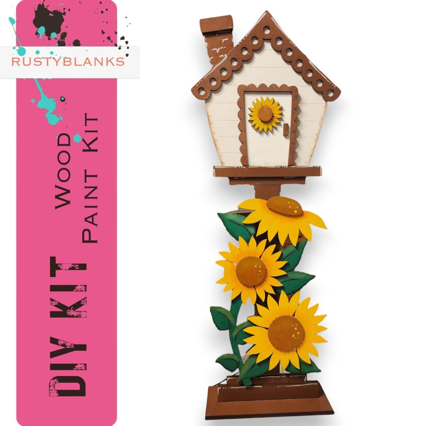 a picture of a bird house with sunflowers