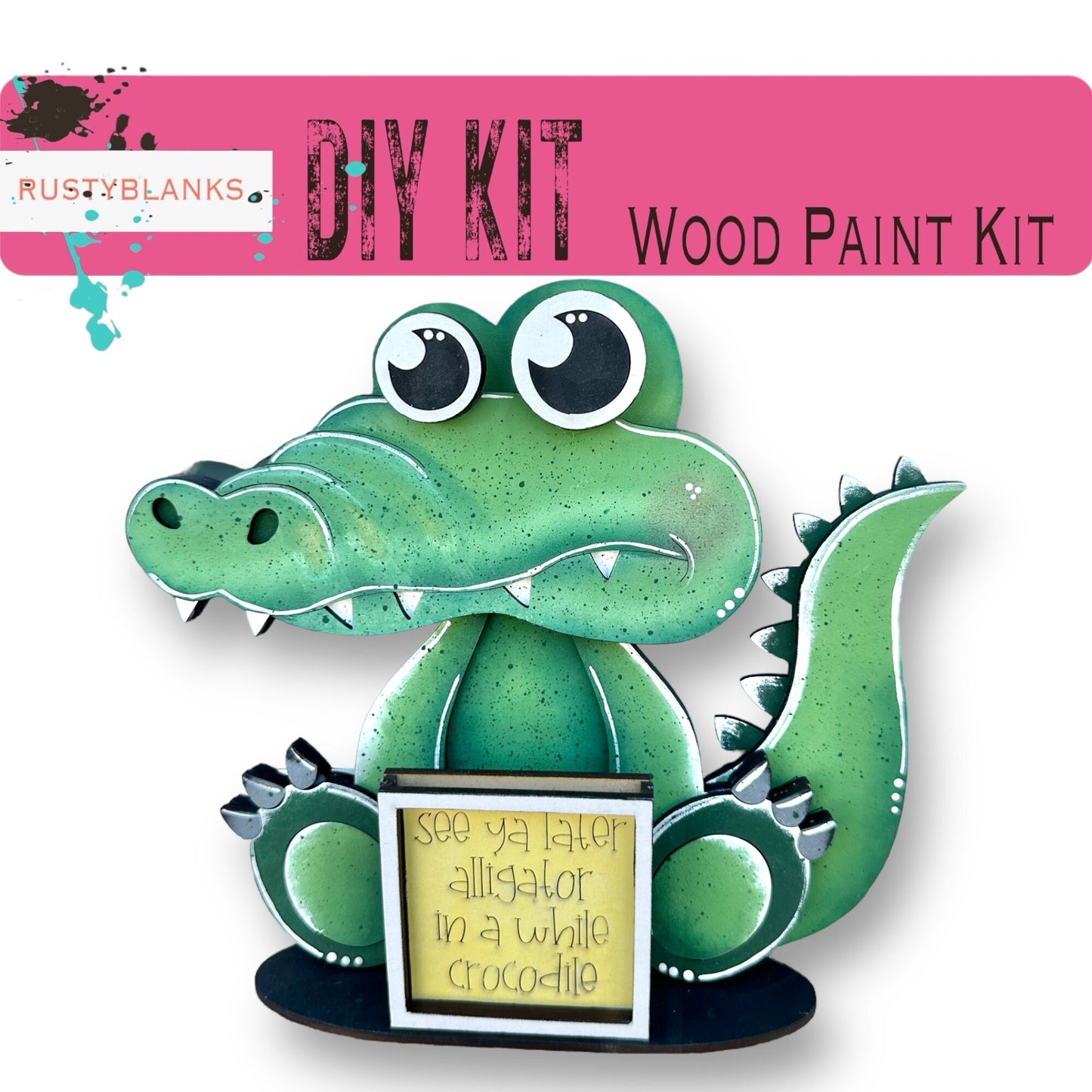 a paper craft kit with a green dragon holding a sign