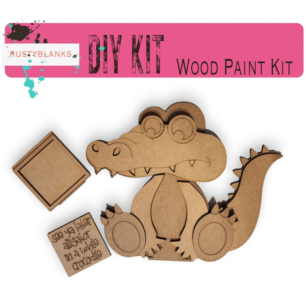 a wooden kit with a picture of a crocodile