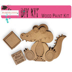 a wooden kit with a picture of a crocodile