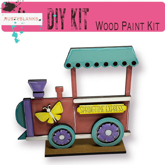 a picture of a wooden paint kit for a train