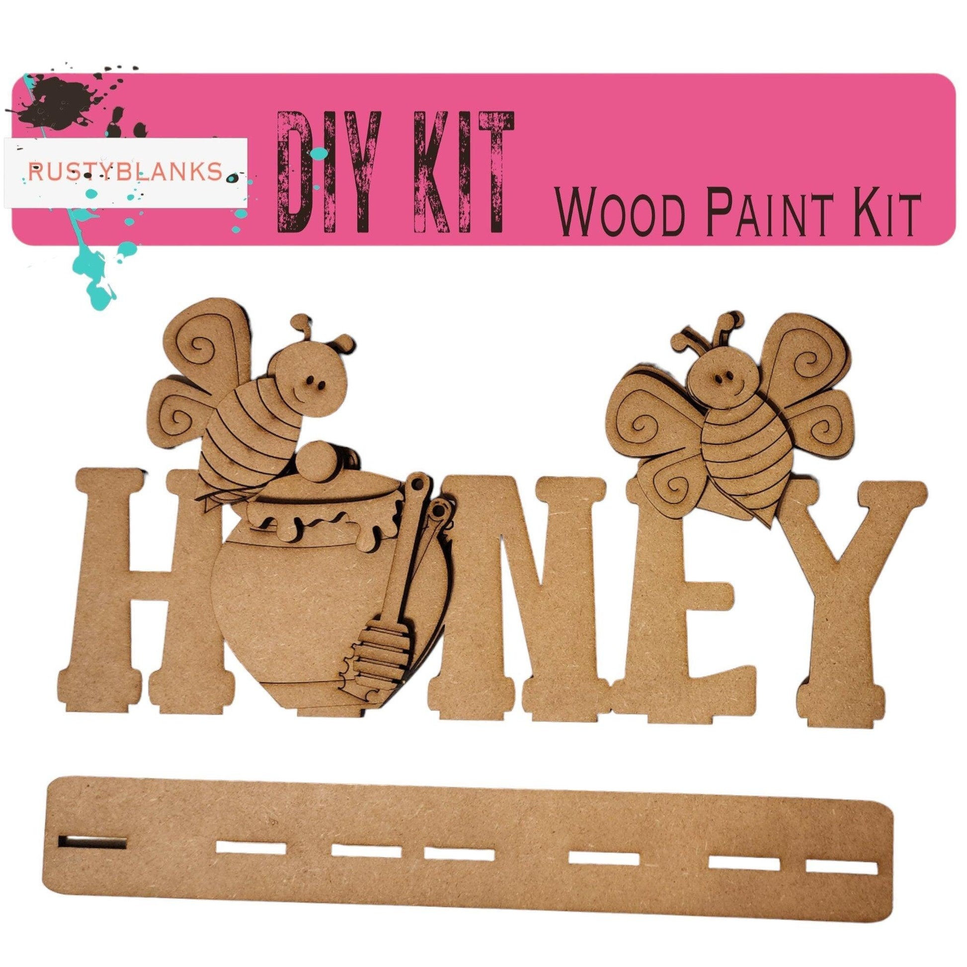 a cut out of wood that says, diy kit, and a picture of