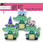 a picture of three alligators with hats on their heads